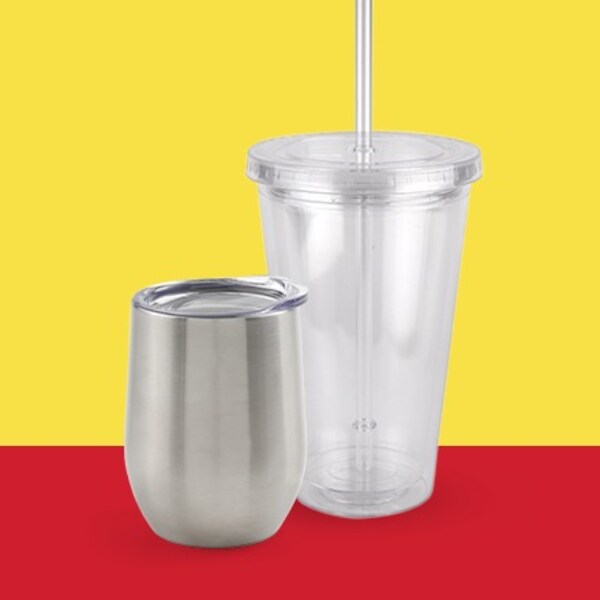 stainless glass and clear plastic tumbler on yellow and red background